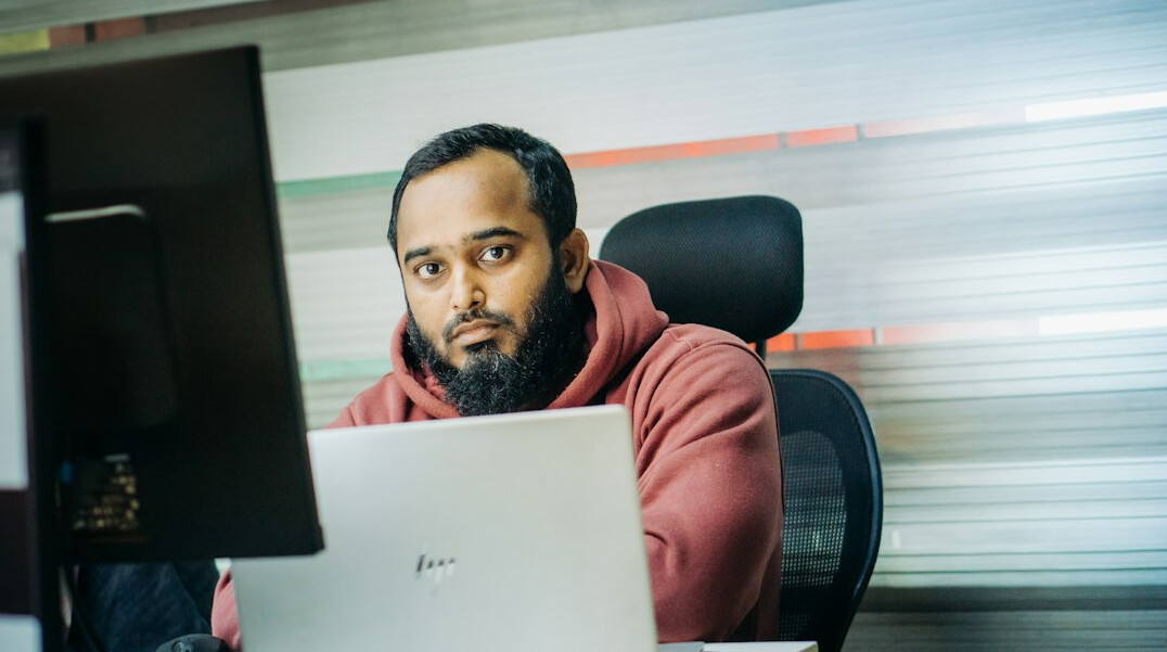 expert programmer at desk